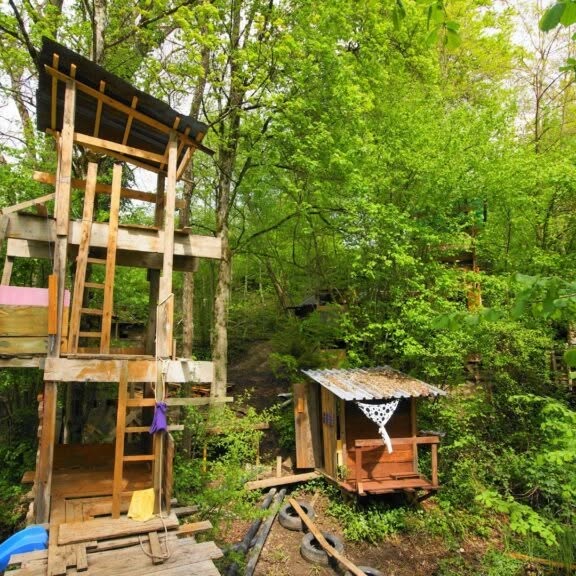 Wooden playhuts in the forest